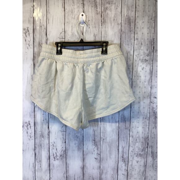 Under Armour Project Rock Fleece Women’s Cream Shorts - Picture 2 of 4